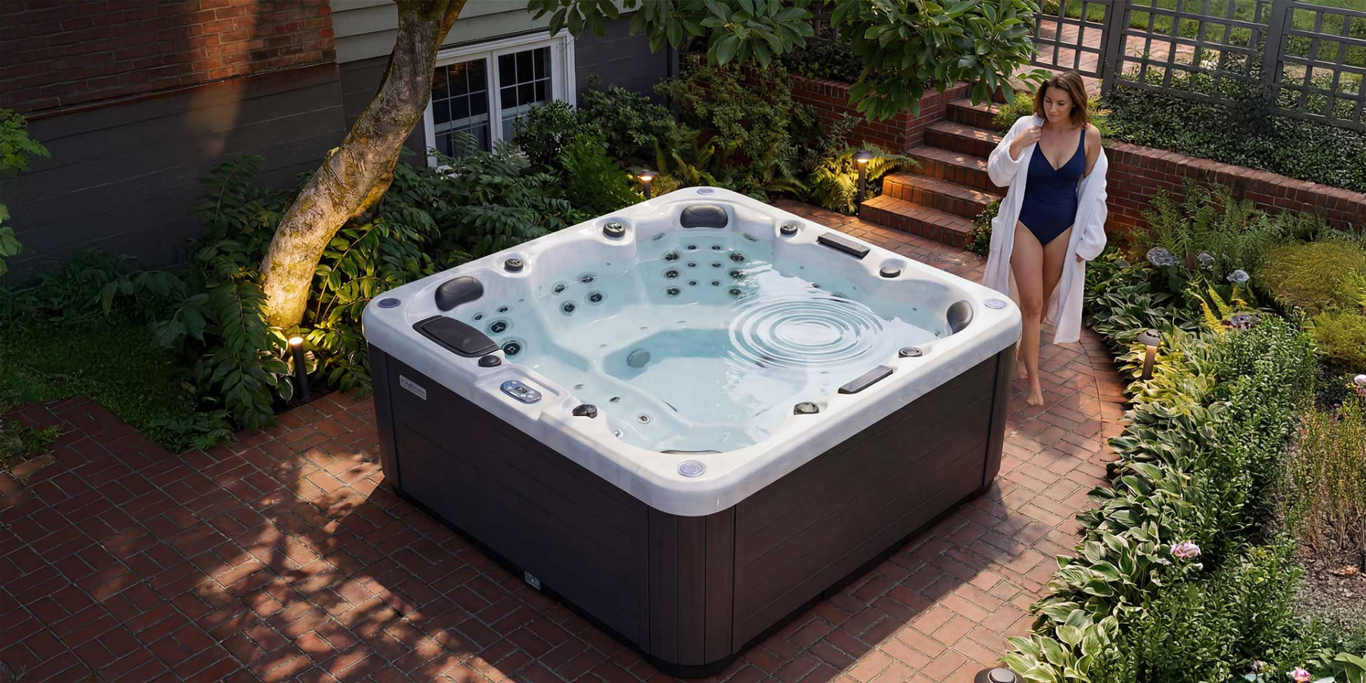 Northern Leisure acrylic hot tub on a brick patio
